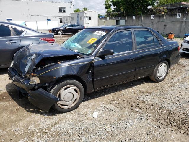 TOYOTA COROLLA VE 2000 with VIN 1NXBR12E4YZ392896 - Photo from auction