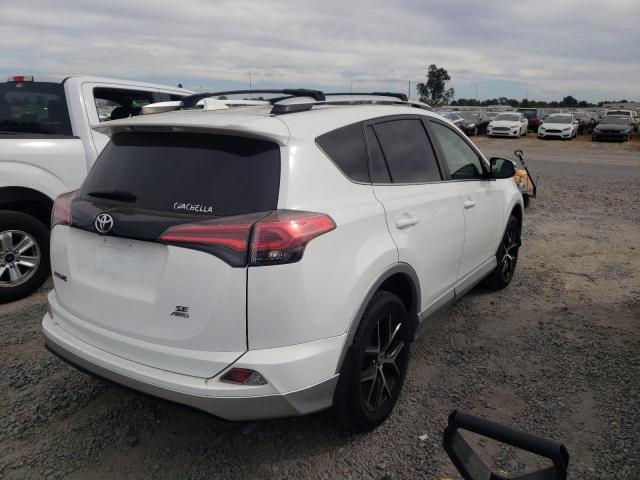 Photo 3 from auction – 2016 TOYOTA RAV4 SE with VIN JTMJFREV3GD175678