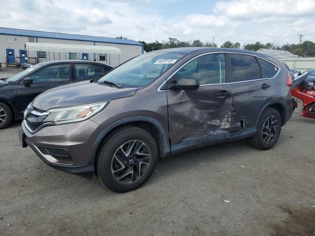HONDA CR-V SE 2016 with VIN 5J6RM4H4XGL034833 - Photo from auction