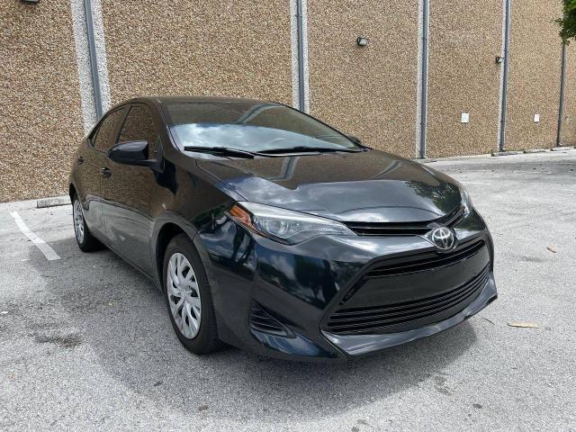 TOYOTA COROLLA L 2019 with VIN 2T1BURHE8KC197574 - Photo from auction