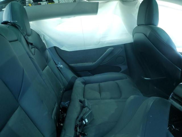 Photo 10 from auction – 2021 TESLA MODEL 3 with VIN 5YJ3E1EC4MF001604
