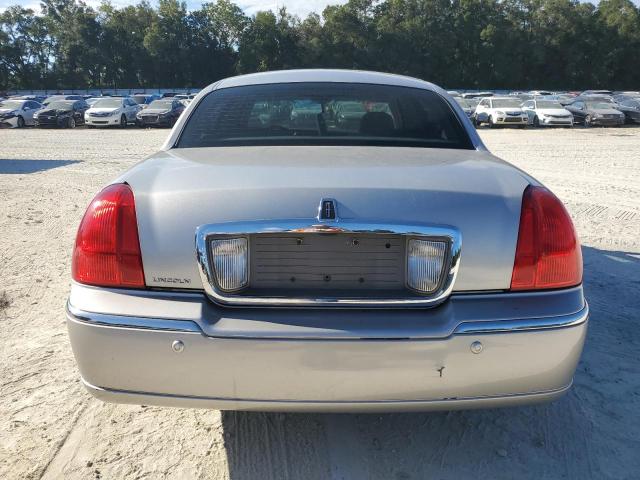 Photo 6 from auction – 2004 LINCOLN TOWN CAR U with VIN 1LNHM83W24Y663403
