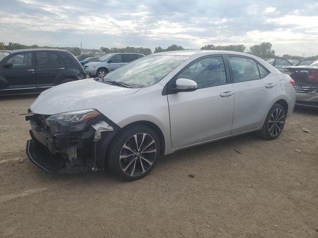TOYOTA COROLLA L 2017 with VIN 5YFBURHE1HP642911 - Photo from auction