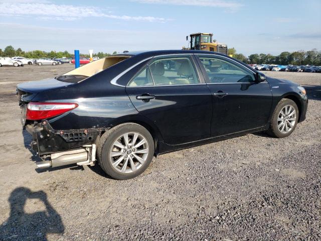 Photo 3 from auction – 2016 TOYOTA CAMRY HYBR with VIN 4T1BD1FK0GU184589