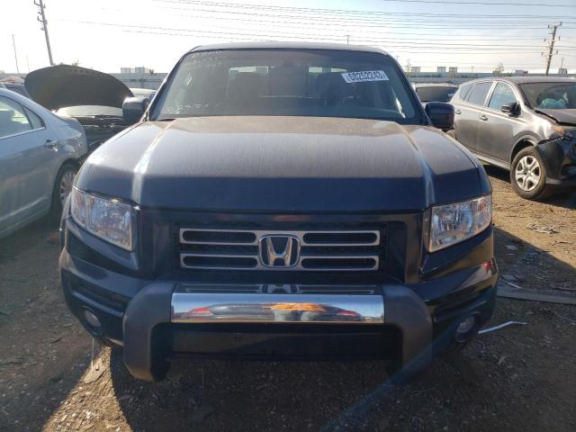 Photo 5 from auction – 2011 HONDA RIDGELINE with VIN 5FPYK1F49BB005903