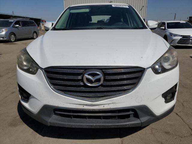Photo 5 from auction – 2016 MAZDA CX-5 TOURI with VIN JM3KE2CY9G0809022