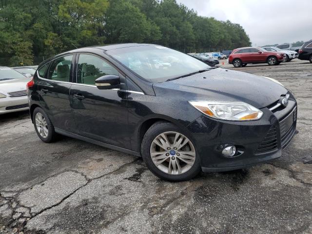 Снимка 4 от търг – 2012 FORD FOCUS SEL с VIN 1FAHP3M24CL231049