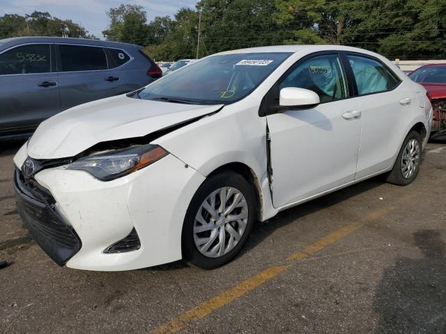 TOYOTA COROLLA L 2019 with VIN 5YFBURHE8KP877829 - Photo from auction