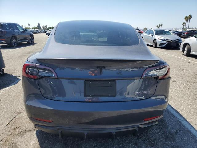 Снимка 6 от търг – 2022 TESLA MODEL 3 с VIN 5YJ3E1ECXNF298802