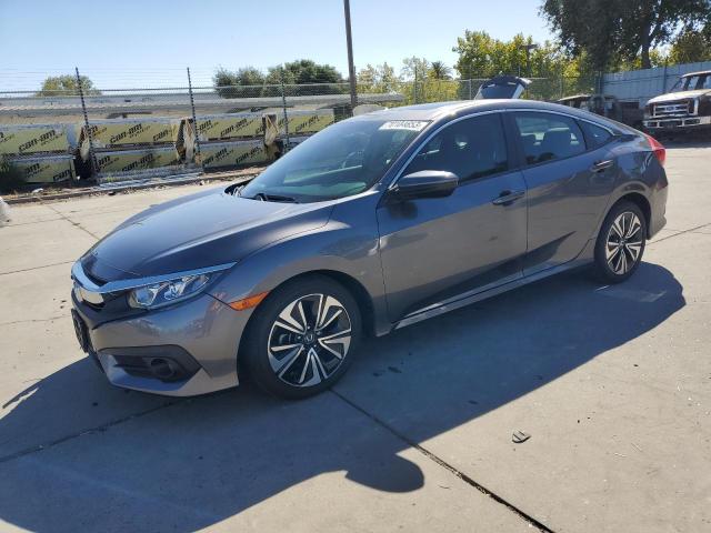Photo 1 from auction – 2018 HONDA CIVIC EX with VIN JHMFC1F39JX014527