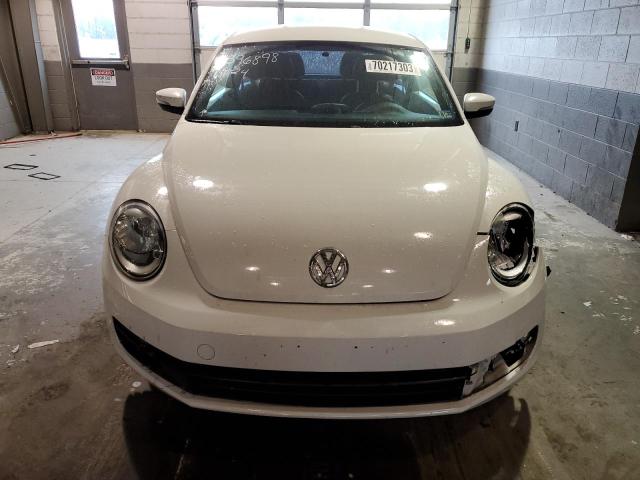 Photo 5 from auction – 2013 VOLKSWAGEN BEETLE with VIN 3VWJP7AT3DM662883