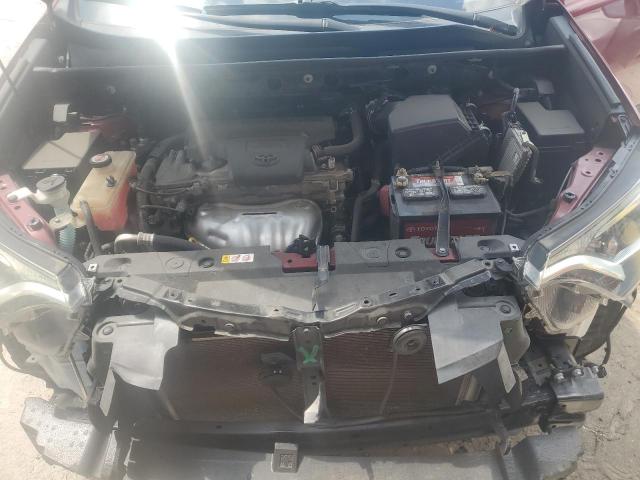 Photo 12 from auction – 2018 TOYOTA RAV4 LE with VIN JTMZFREV3JD120562