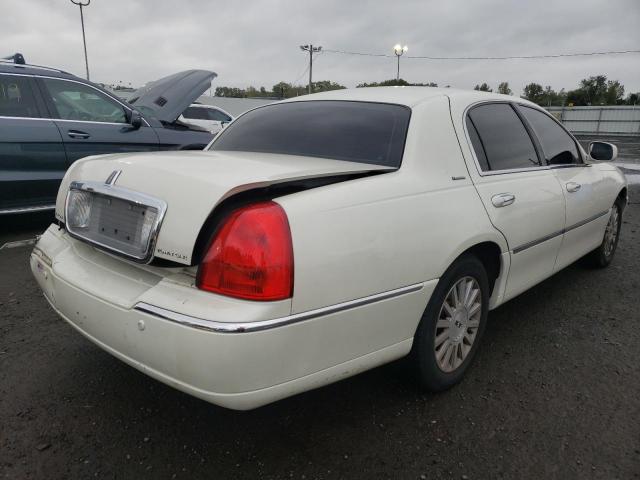 Photo 3 from auction – 2003 LINCOLN TOWN CAR E with VIN 1LNHM81W13Y685460