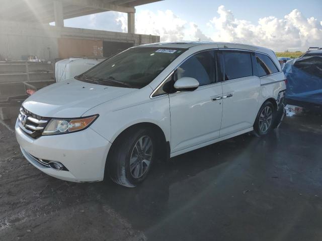 HONDA ODYSSEY TO 2015 with VIN 5FNRL5H94FB034645 - Photo from auction