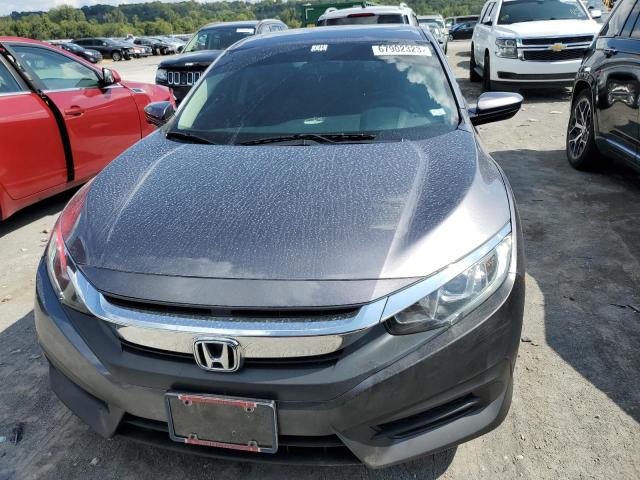 Photo 5 from auction – 2018 HONDA CIVIC EX with VIN 19XFC2F77JE038514