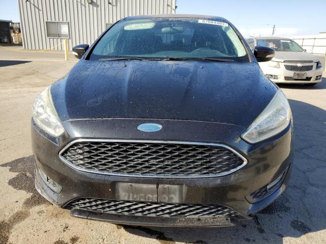 Снимка 5 от търг – 2015 FORD FOCUS SE с VIN 1FADP3F24FL294264
