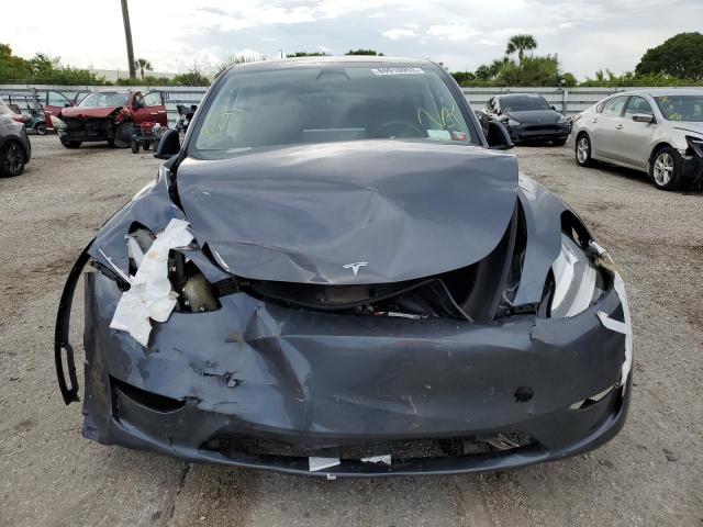 Photo 5 from auction – 2023 TESLA MODEL Y with VIN 7SAYGDEE2PA092542