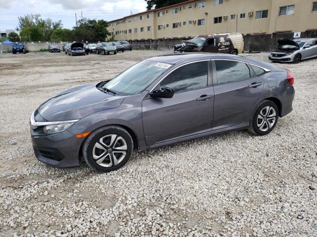 HONDA CIVIC LX 2018 with VIN 2HGFC2F5XJH562096 - Photo from auction