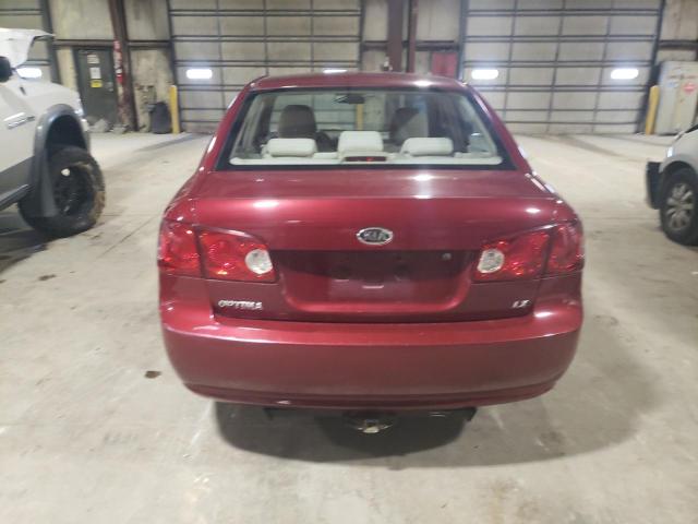 Photo 6 from auction – 2006 KIA OPTIMA LX with VIN KNAGE123965068030