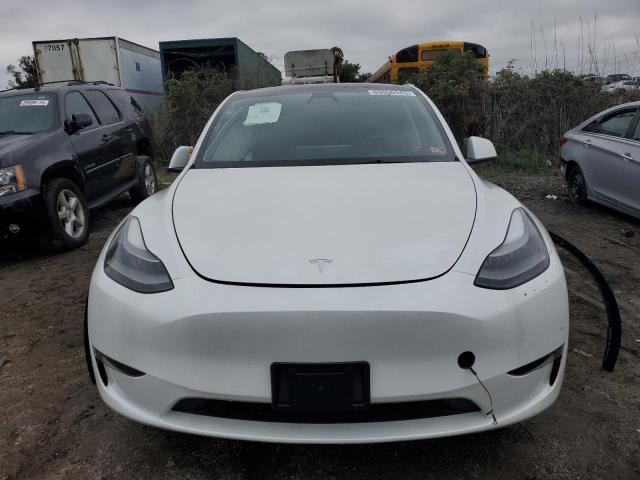 Photo 5 from auction – 2023 TESLA MODEL Y with VIN 7SAYGAEE4PF668679