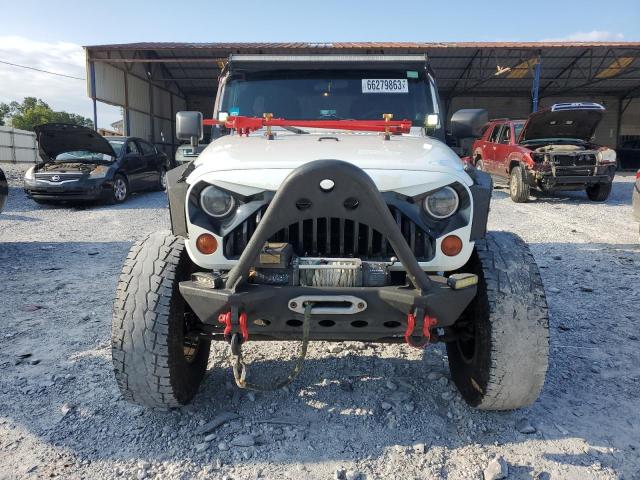 Photo 5 from auction – 2011 JEEP WRANGLER U with VIN 1J4BA3H15BL581821