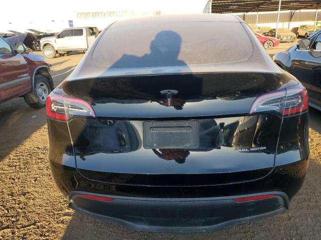 Photo 6 from auction – 2023 TESLA MODEL Y with VIN 7SAYGDEE3PF605493