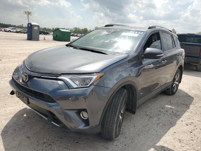 Photo 1 from auction – 2017 TOYOTA RAV4 XLE with VIN JTMWFREV0HD095827