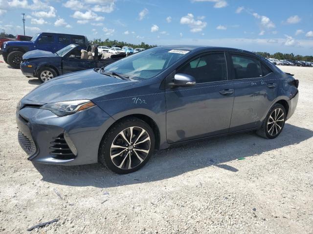 Снимка 1 от търг – 2017 TOYOTA COROLLA L с VIN 5YFBURHEXHP582529