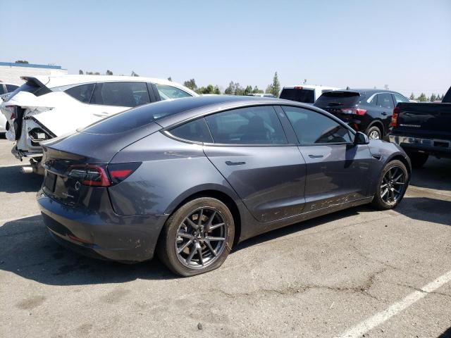 Photo 3 from auction – 2021 TESLA MODEL 3 with VIN 5YJ3E1EB9MF002853