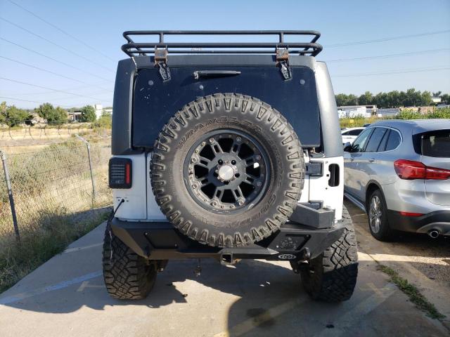 Photo 6 from auction – 2012 JEEP WRANGLER U with VIN 1C4BJWFG2CL101878