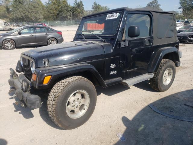 JEEP WRANGLER / 2003 with VIN 1J4FA59S03P343292 - Photo from auction