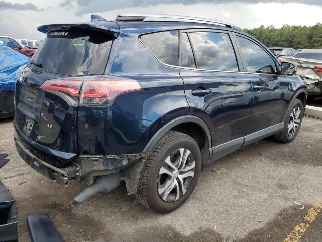 Photo 3 from auction – 2018 TOYOTA RAV4 LE with VIN JTMZFREV7JJ725461