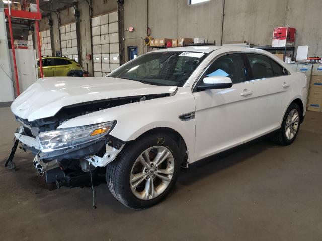FORD TAURUS SEL 2014 with VIN 1FAHP2H83EG157451 - Photo from auction