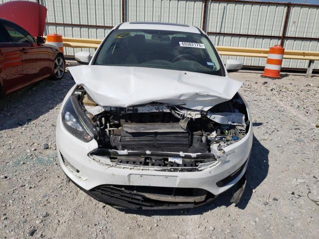 Photo 5 from auction – 2018 FORD FOCUS SEL with VIN 1FADP3H27JL216356