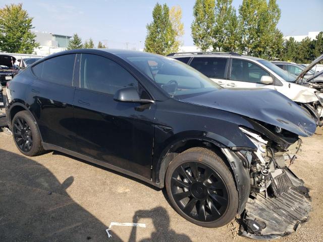 Photo 4 from auction – 2022 TESLA MODEL Y with VIN 7SAYGDEEXNF574711