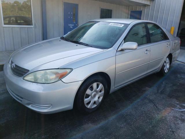 TOYOTA CAMRY LE 2004 with VIN 4T1BE32K24U836624 - Photo from auction