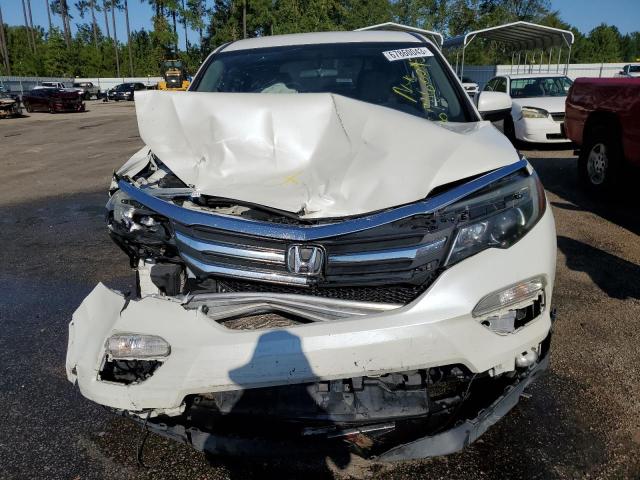 Photo 12 from auction – 2016 HONDA PILOT EX with VIN 5FNYF5H34GB007008