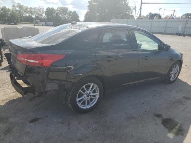 Photo 3 from auction – 2015 FORD FOCUS SE with VIN 1FADP3F24FL230015
