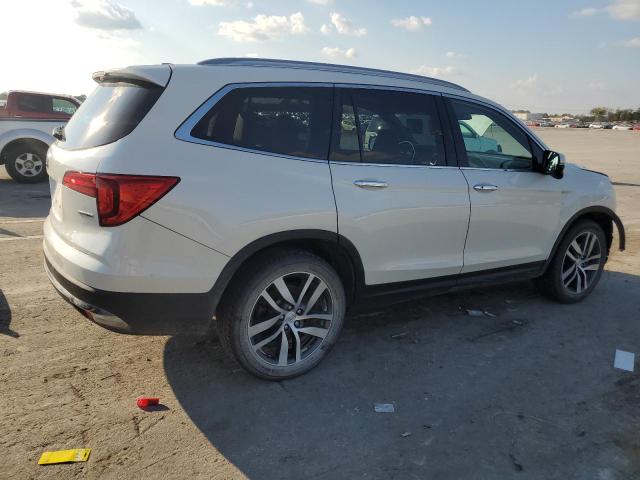 Photo 3 from auction – 2017 HONDA PILOT TOUR with VIN 5FNYF5H92HB034505