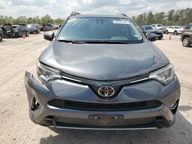 Photo 5 from auction – 2017 TOYOTA RAV4 XLE with VIN JTMWFREV0HD095827