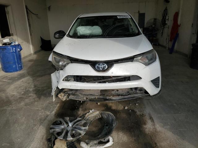 Photo 5 from auction – 2018 TOYOTA RAV4 LE with VIN 2T3ZFREV6JW468987