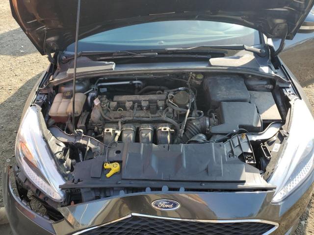 Photo 11 from auction – 2015 FORD FOCUS SE with VIN 1FADP3F26FL287851