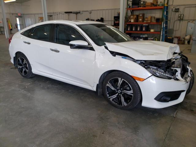 Photo 4 from auction – 2017 HONDA CIVIC TOUR with VIN 19XFC1F99HE020103