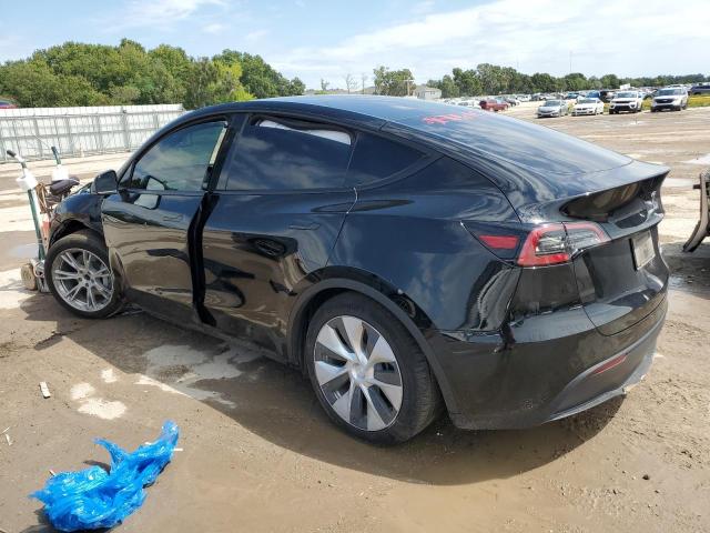 Photo 2 from auction – 2022 TESLA MODEL Y with VIN 7SAYGAEE1NF337443