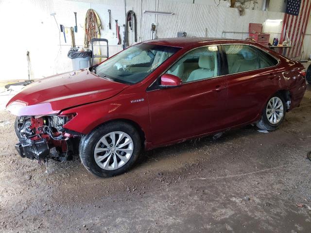 TOYOTA CAMRY HYBR 2015 with VIN 4T1BD1FK2FU170823 - Photo from auction