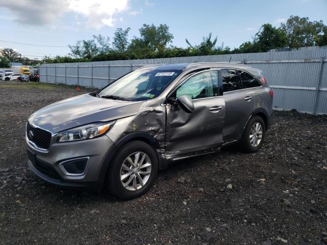 KIA SORENTO LX 2018 with VIN 5XYPGDA58JG368224 - Photo from auction