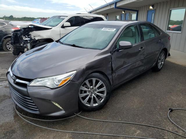 TOYOTA CAMRY LE 2017 with VIN 4T1BF1FK6HU654362 - Photo from auction