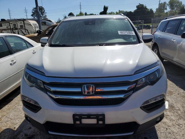 Photo 5 from auction – 2018 HONDA PILOT TOUR with VIN 5FNYF6H98JB070064