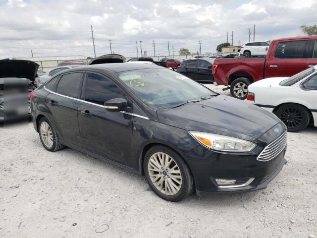 Photo 4 from auction – 2015 FORD FOCUS TITA with VIN 1FADP3J27FL240609