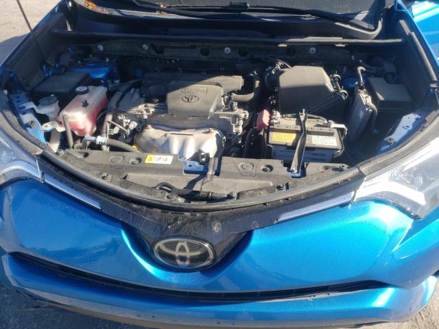 Photo 11 from auction – 2018 TOYOTA RAV4 LE with VIN JTMBFREV6JJ182976